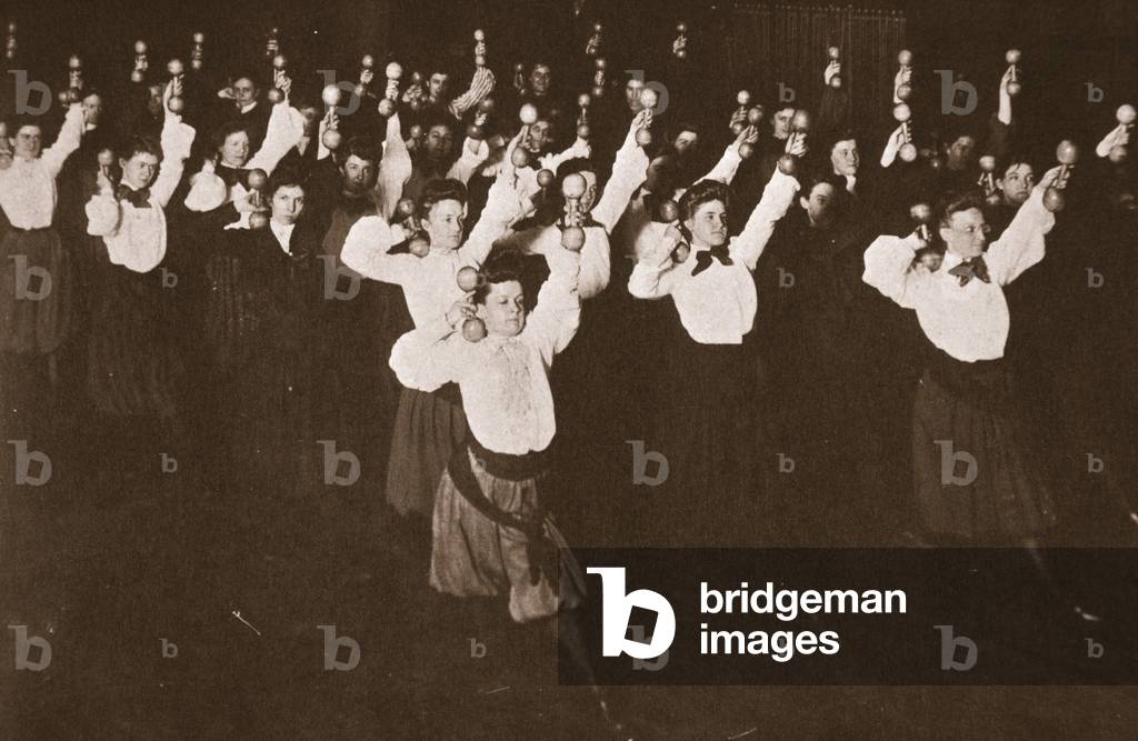 YWCA Girls exercising, 1910s (sepia photo)