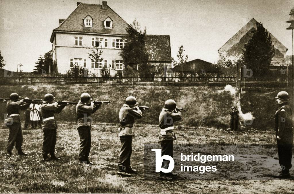 A German saboteur is shot by an American firing squad, Germany, 1945 (b/w photo)