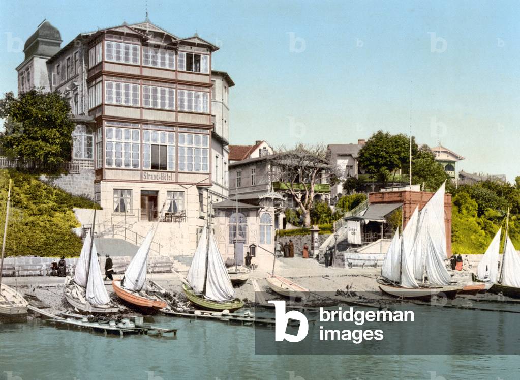 Sailing boats on the beach in front of the Strand Hotel, on the Isle of Rugen, Germany, pub. c.1895 (postcard chromolithograph)