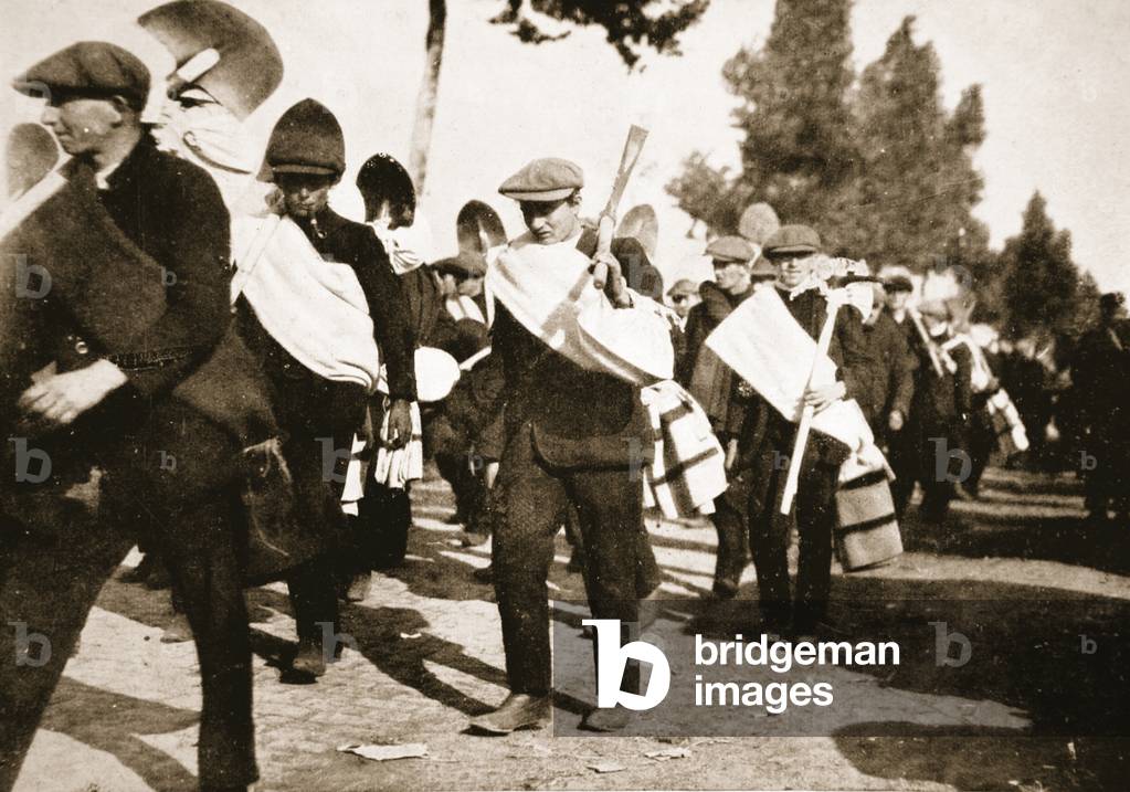 Young Belgians doing their part to save their country: untrained lads marching to dig shelter-trenches for the soldiers, from 'The Illustrated War News', 1916 (b/w photo)