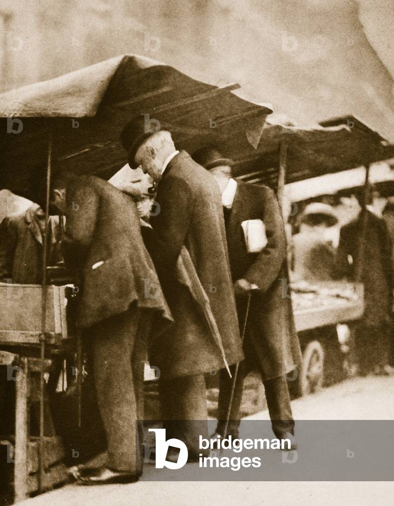 A bookstall at Farringdon Road Market (sepia photo)