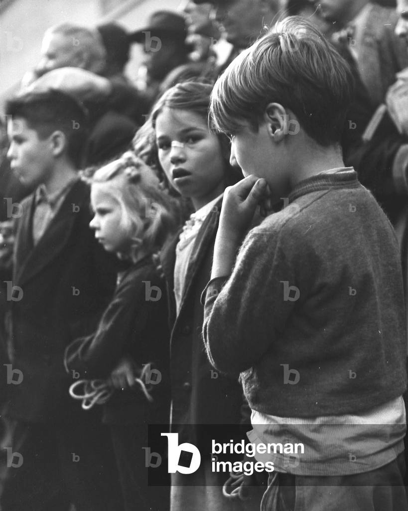 Girl, bandaid on nose, NY