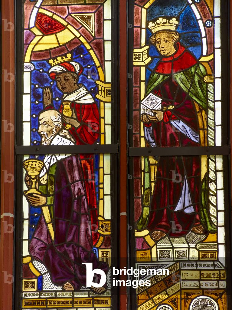 Detail from stained glass window scene of the Adoration of the Magi (1406) at 15th century fortified church, Ingelheim (colour photo)