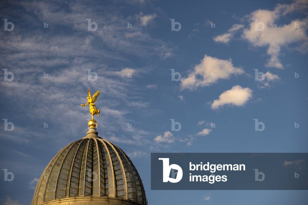 Figure of Fama, Roman goddess of rumour and in this case the fame of art, Dresden, Germany (photo)