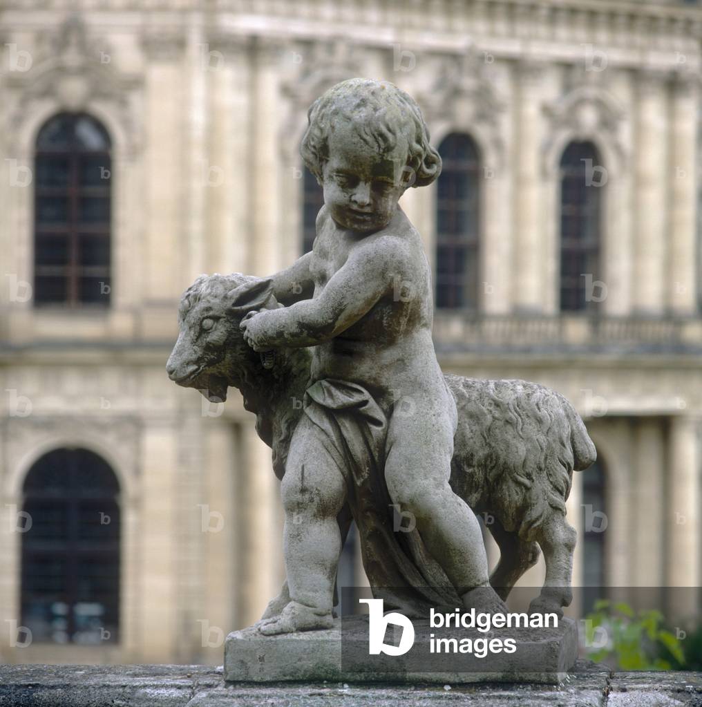 Sculpture of a young boy with a lamb in the garden of the Residenz (stone)
