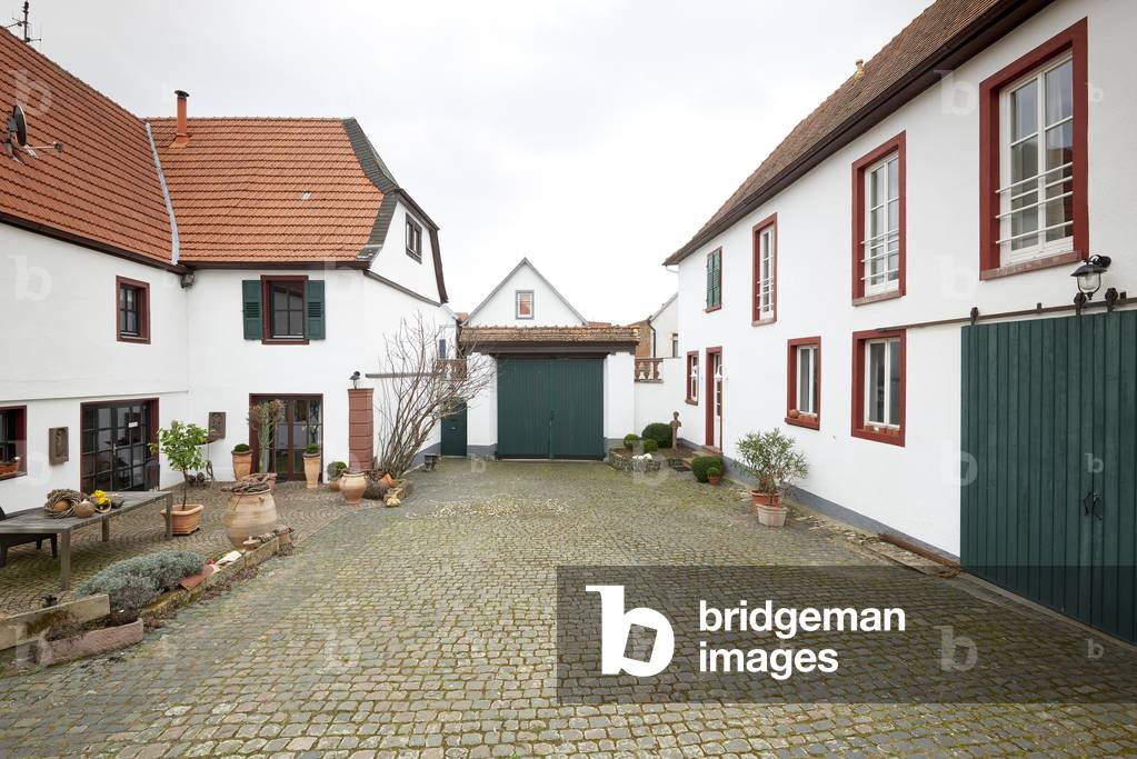 Courtyard of an 18th century four-sided farm, Mettenheim (colour photo)