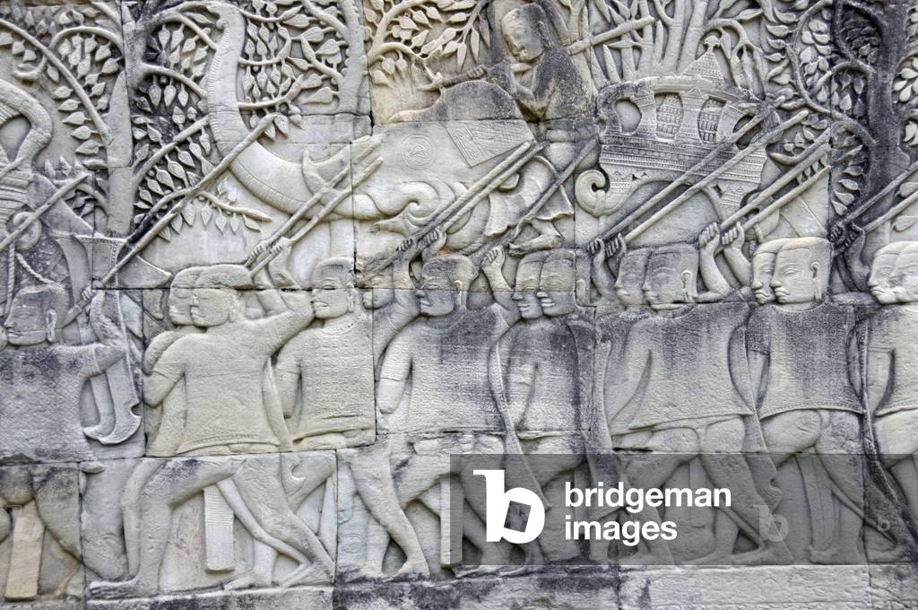 A Khmer army on the march with an elephant, relief at the Bayon temple, built 1181-1219, Angkor, Cambodia (photo)