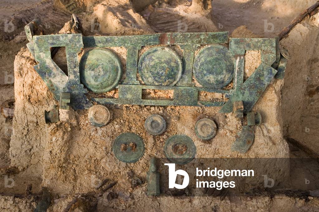 Backboard of a wagon with strips, shields and discs (bronze)