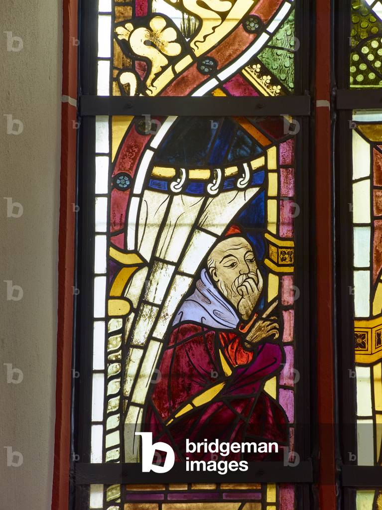 Stained glass window detail of Joseph as an old man (1406) at 15th century fortified church, Ingelheim (colour photo)