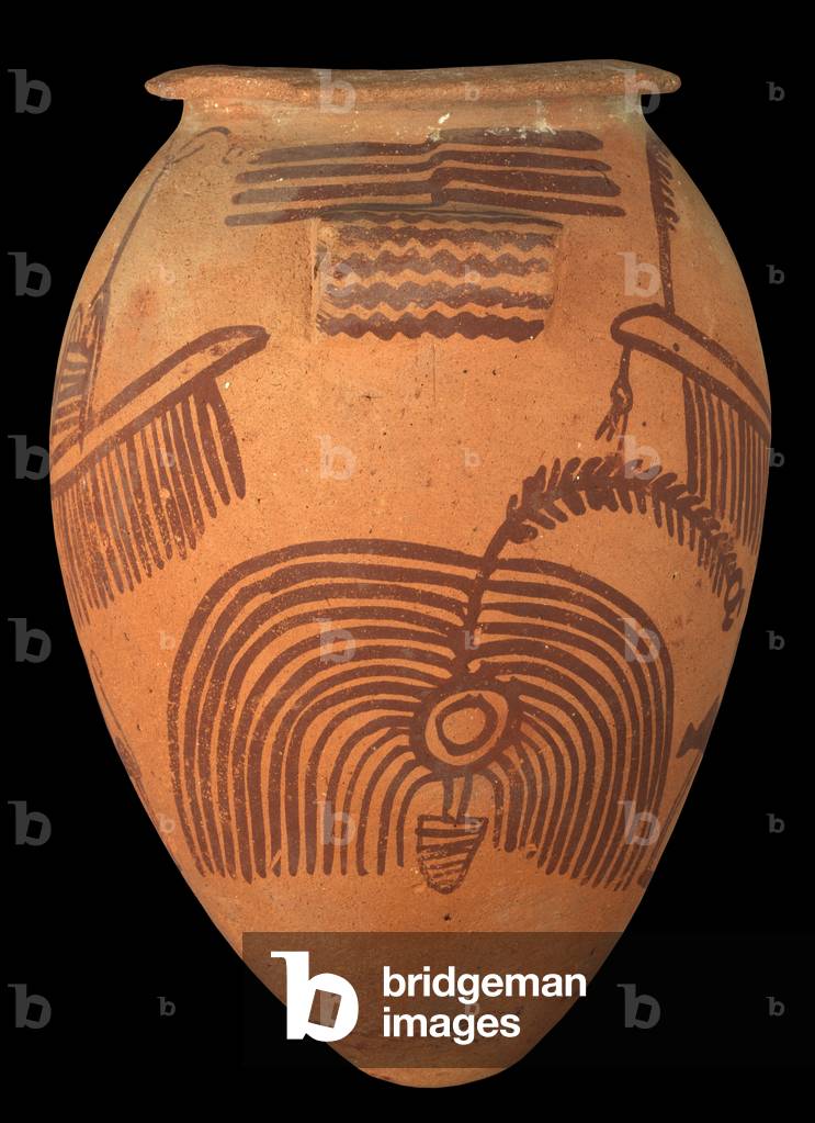 pottery vessel with coloured decoration