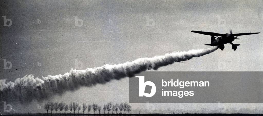 Westland Lysander laying a smoke screen (b/w photo)