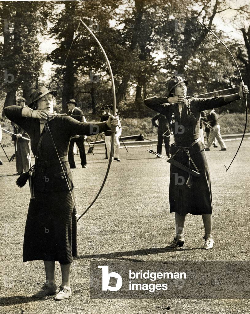 Mrs. A. E. Williamson and Mrs. Ingo Simon in the Firing Line, Ranelagh Club archery meeting, 14th May 1936 (b/w photo)