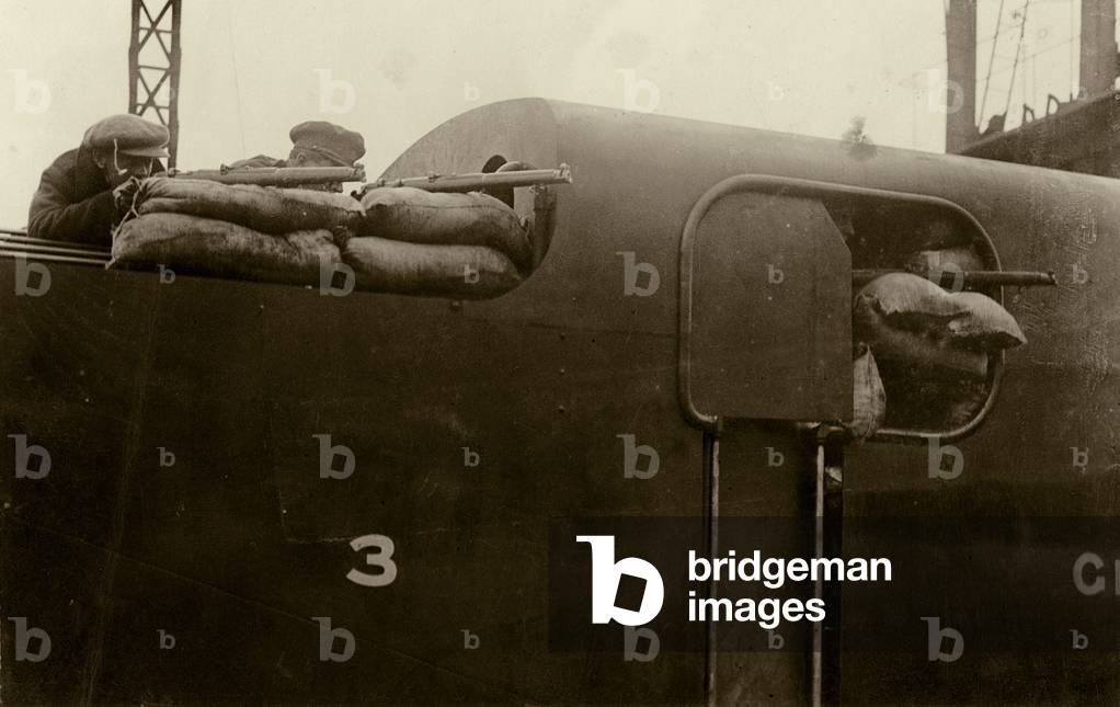 Snipers engaged on the armoured engine which assisted in the capture of Moran's Hotel, Dublin, 1922-23 (b/w photo)