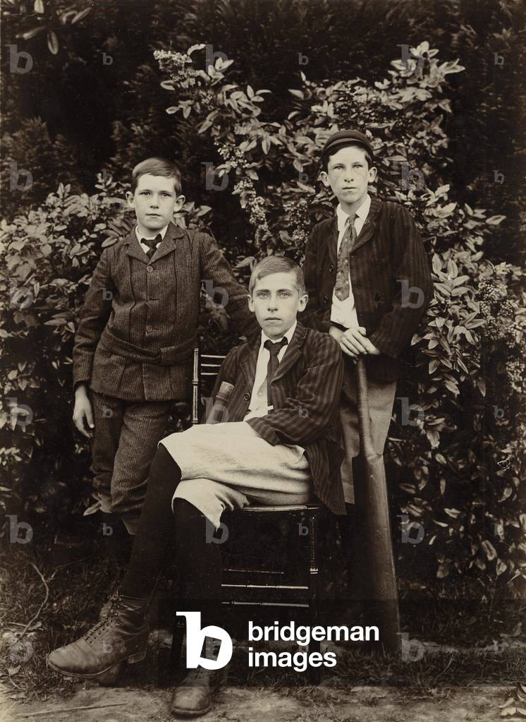 Three boys with cricket bats, c.1900-20 (photo)