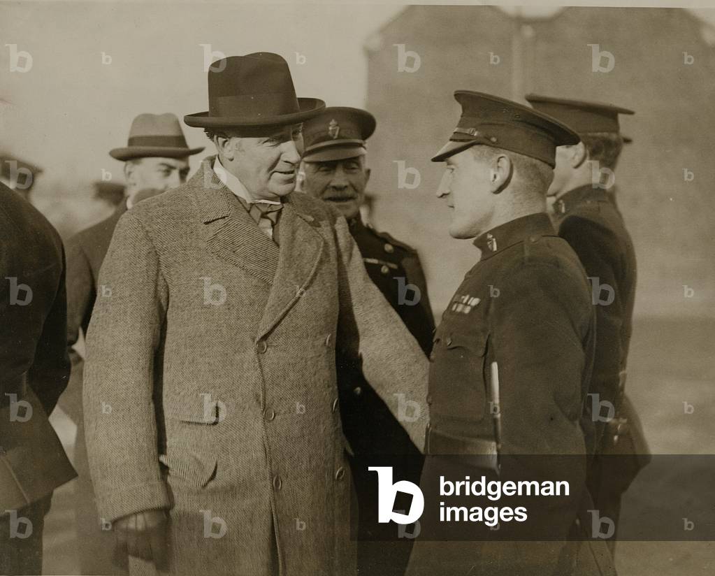Sir Hamar Greenwood chatting to one of the members of the Royal Irish Constabulary who won the Distinguished Conduct Medal in France, c.1920-22 (b/w photo)