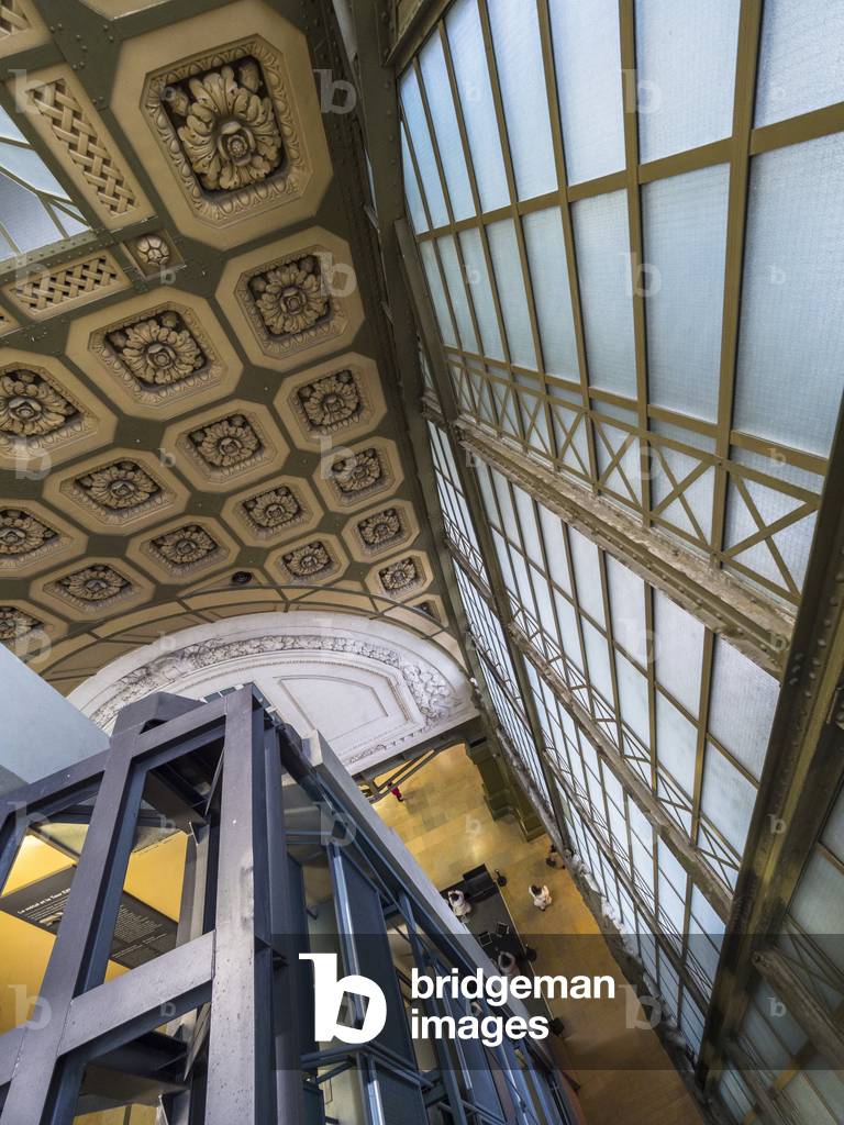 the Orsay Museum. Paris. France - Detail of the central structure of glass and steel with the decorative macaroons of the train station - Musee d'Orsay, Paris - Photography 2017
