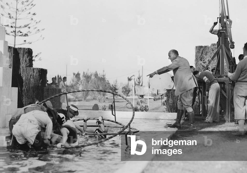 Cecil B. DeMille at the shooting of the 'Dynamite', 1929 (b/w photo)