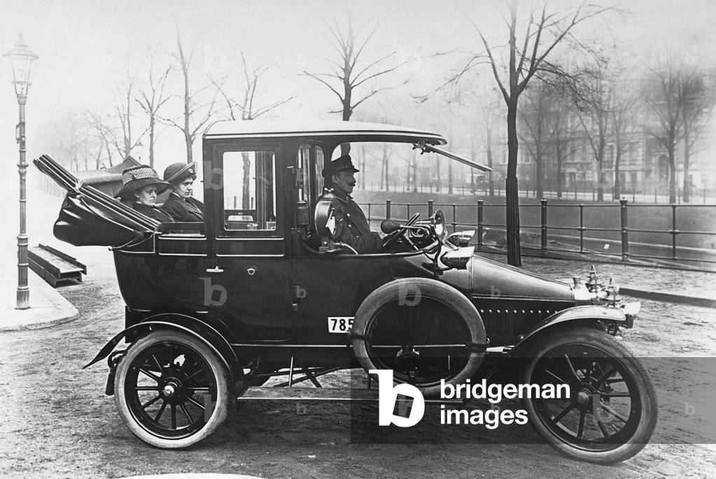 A taxi in Berlin, 1911 (b/w photo)