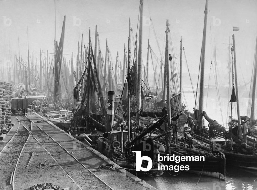 Fishing fleet in a river port, 1912 (b/w photo)