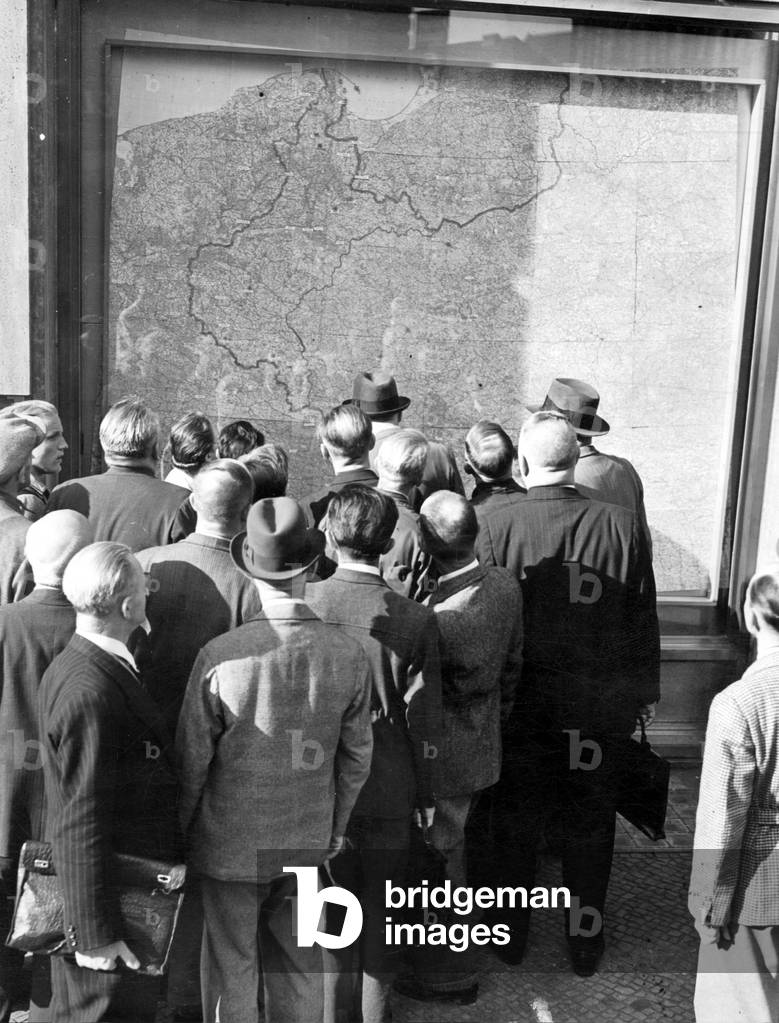 Civilians in Berlin follow the fights in Poland, 1939 (b/w photo)