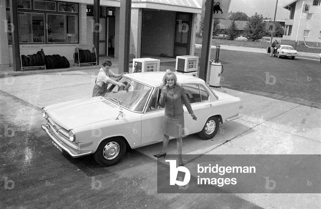 A woman posing with a Glas 1700, 1963 (b/w photo)