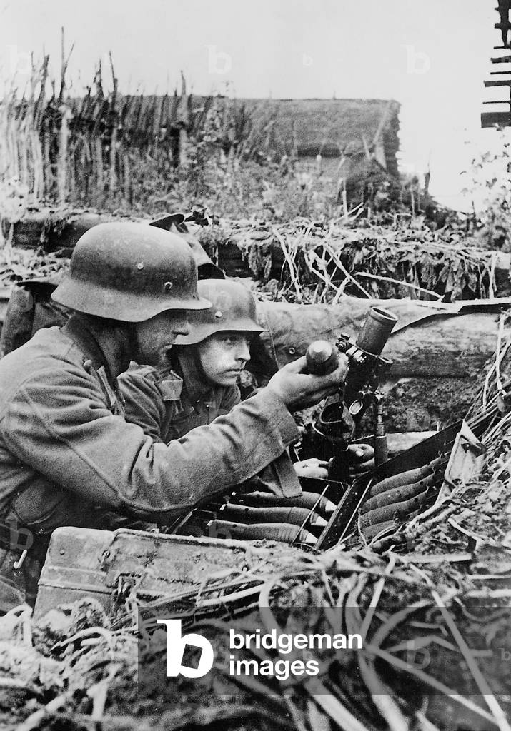 German soldiers with a grenade launcher in WWII on the Eastern front (b/w photo)