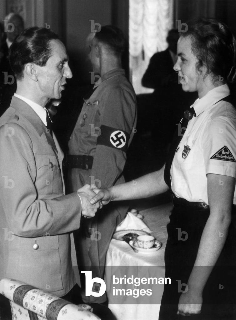 Joseph Goebbels greets a BDM girl, 1937 (b/w photo)