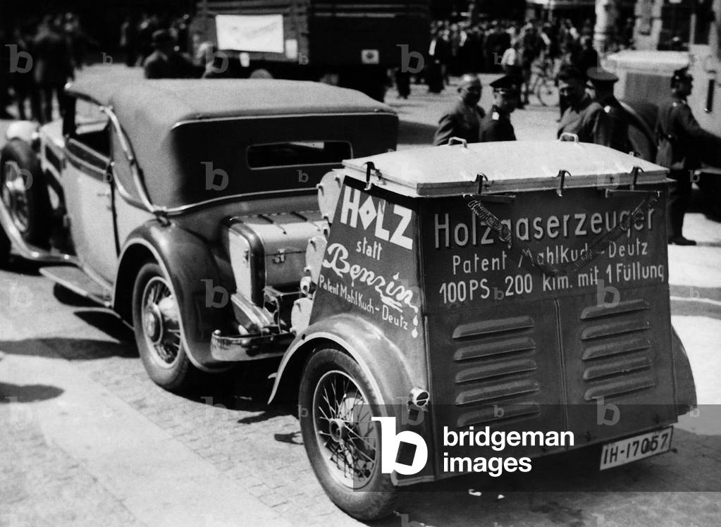 Exhibition tour of cars with gas wood power, 1935 (b/w photo)
