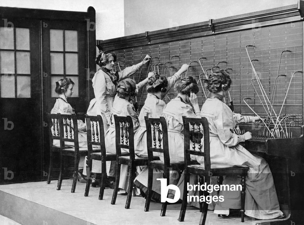Women at the telephone exchange, c.1900 (b/w photo)