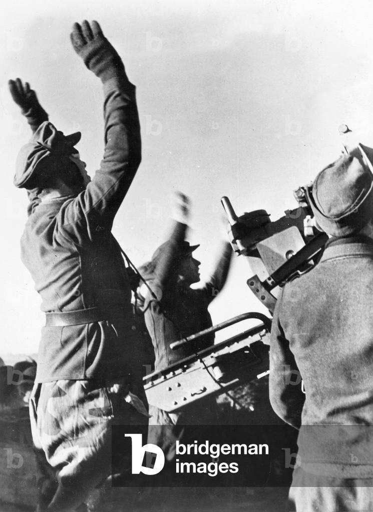 German Flak soldiers celebrate shooting down a Soviet airplane, 1945 (b/w photo)