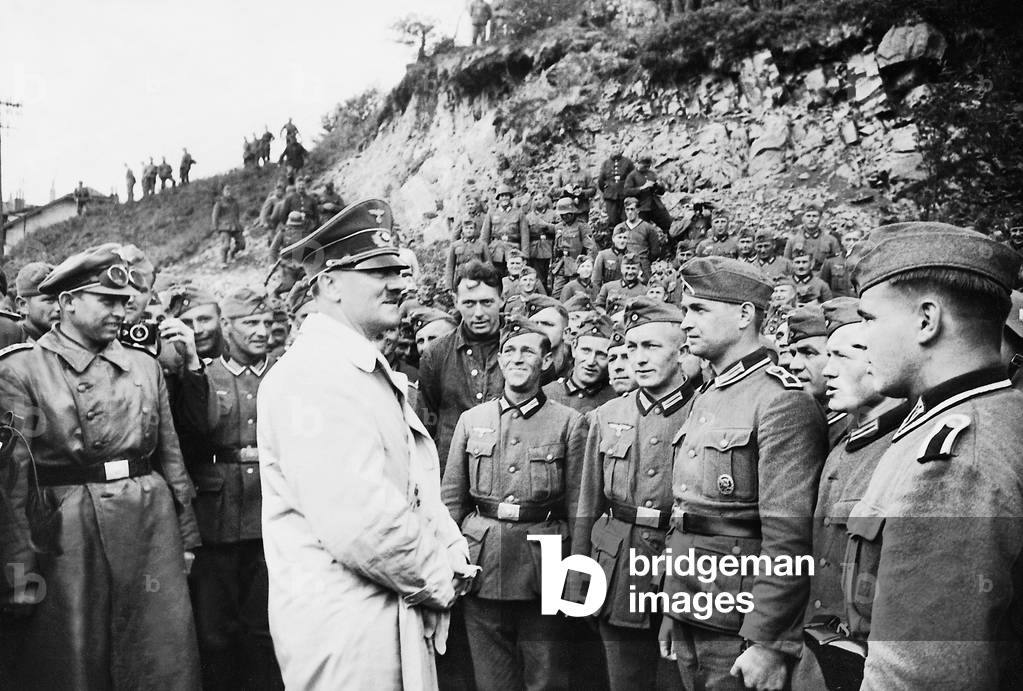 Adolf Hitler during a stop on the front in France, 1940 (b/w photo)