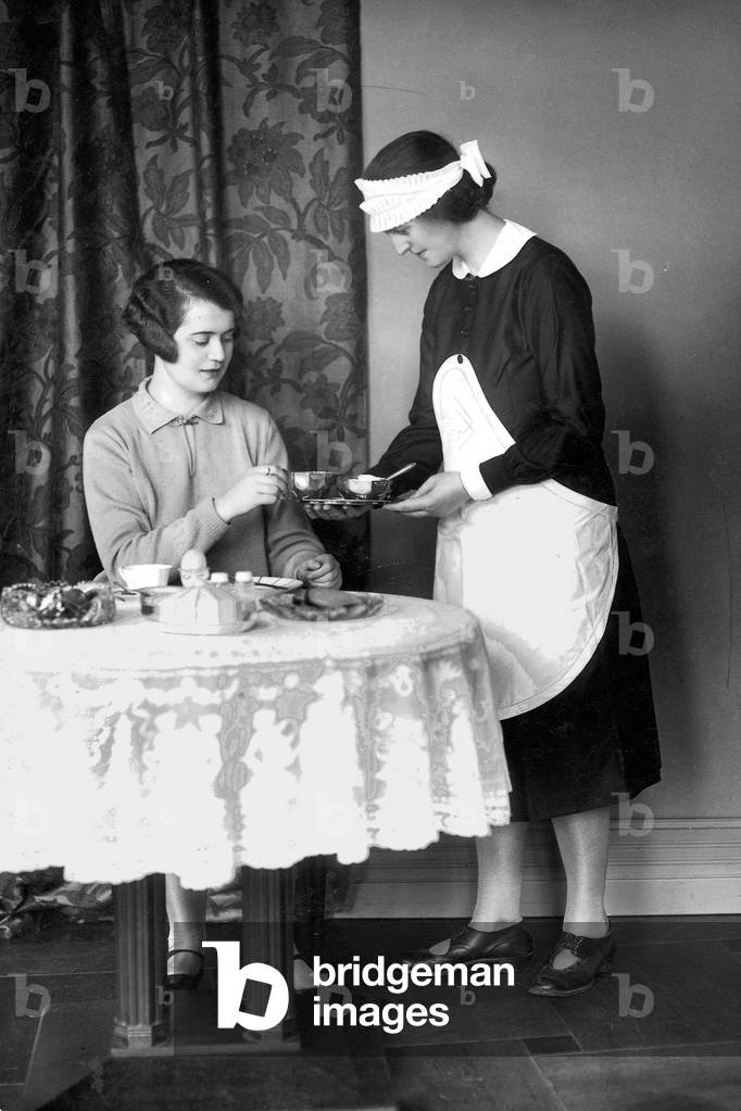 Female service staff (1928) (b/w photo)