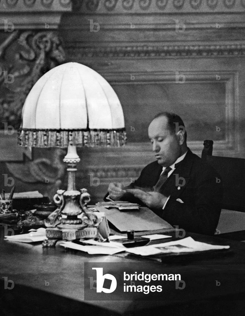 Benito Mussolini in his workroom in Rome, 1928 (b/w photo)