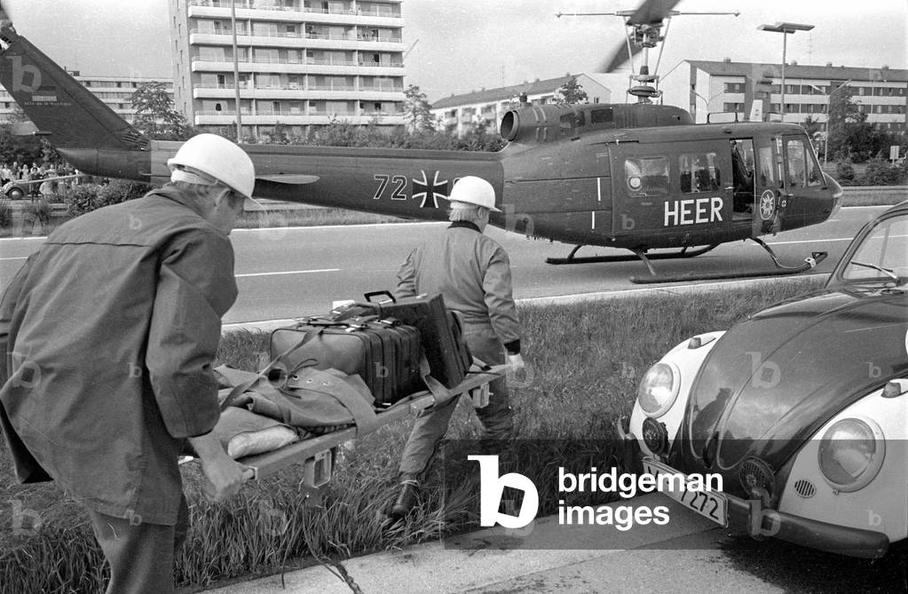 Rescue mission by helicopter near Munich, 1973 (b/w photo)
