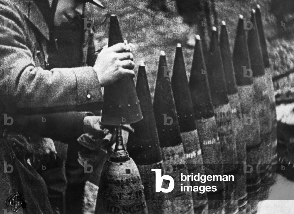 German soldier primes a grenades in France, 1940
