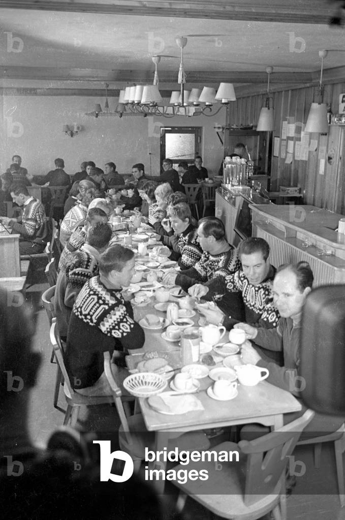 Skiers at lunch in the restaurant of the Weissseehaus, 1962 (b/w photo)