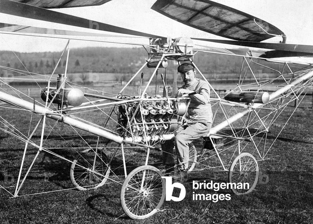 Pierre Cornu in a helicopter, 1907 (b/w photo)