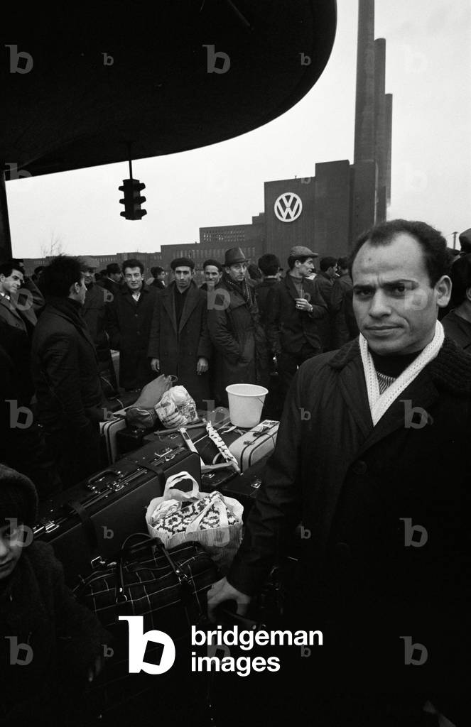 About 360000 Italians work in Germany and many of them take their vacation time to visit the family left behind in Italy. (b/w photo)