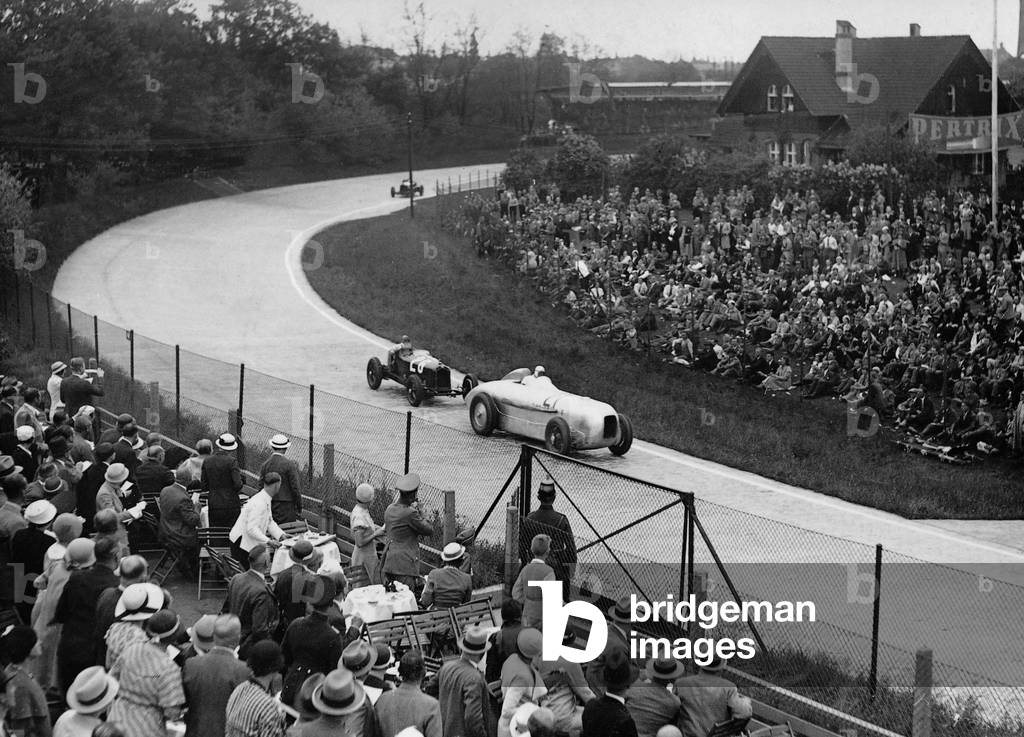 Manfred von Brauchitsch during a race at the Avus, 1933 (b/w photo)