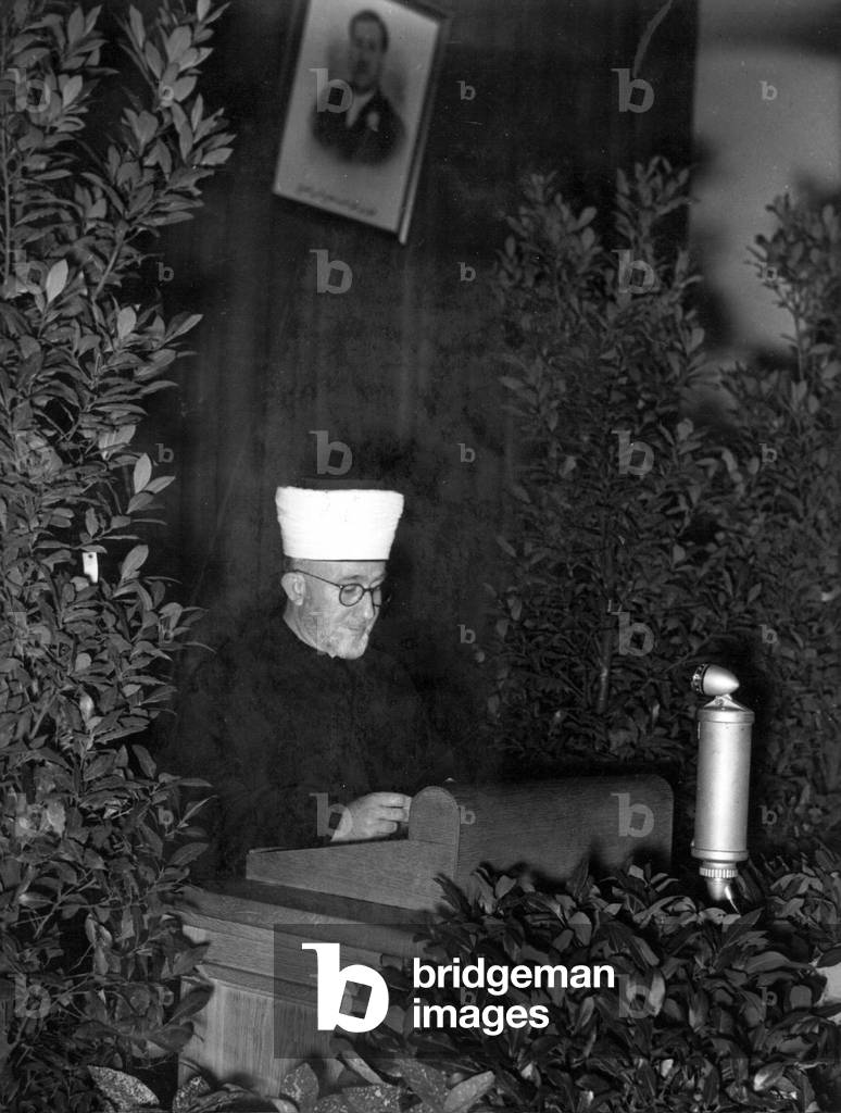 Amin al-Husayni at an anti-British meeting in Berlin, 1943 (b/w photo)