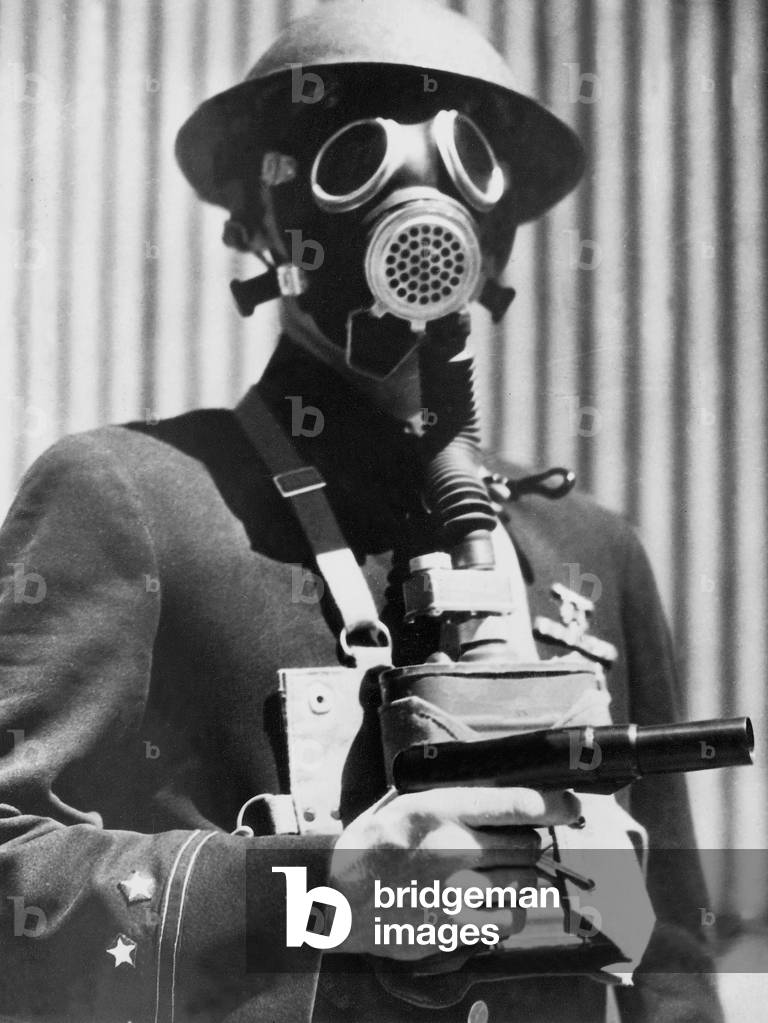 American policeman during a strike with tear gas equipment, 1934 (b/w photo)