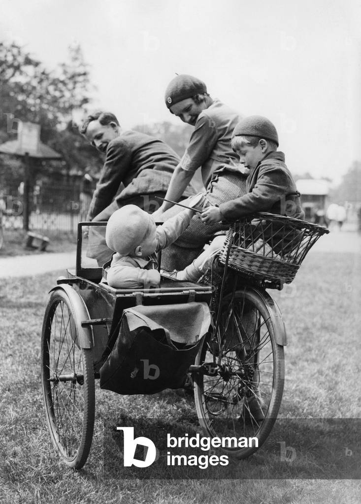 Family on tandem during a trip to England, 1937