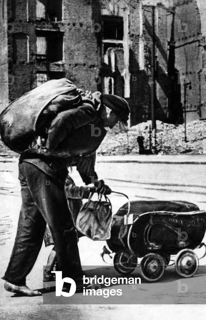 Woman with child after the conquest of Berlin, 1945