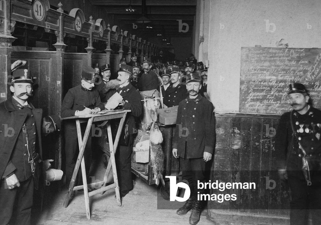 Sorting packages in Vienna (b/w photo)