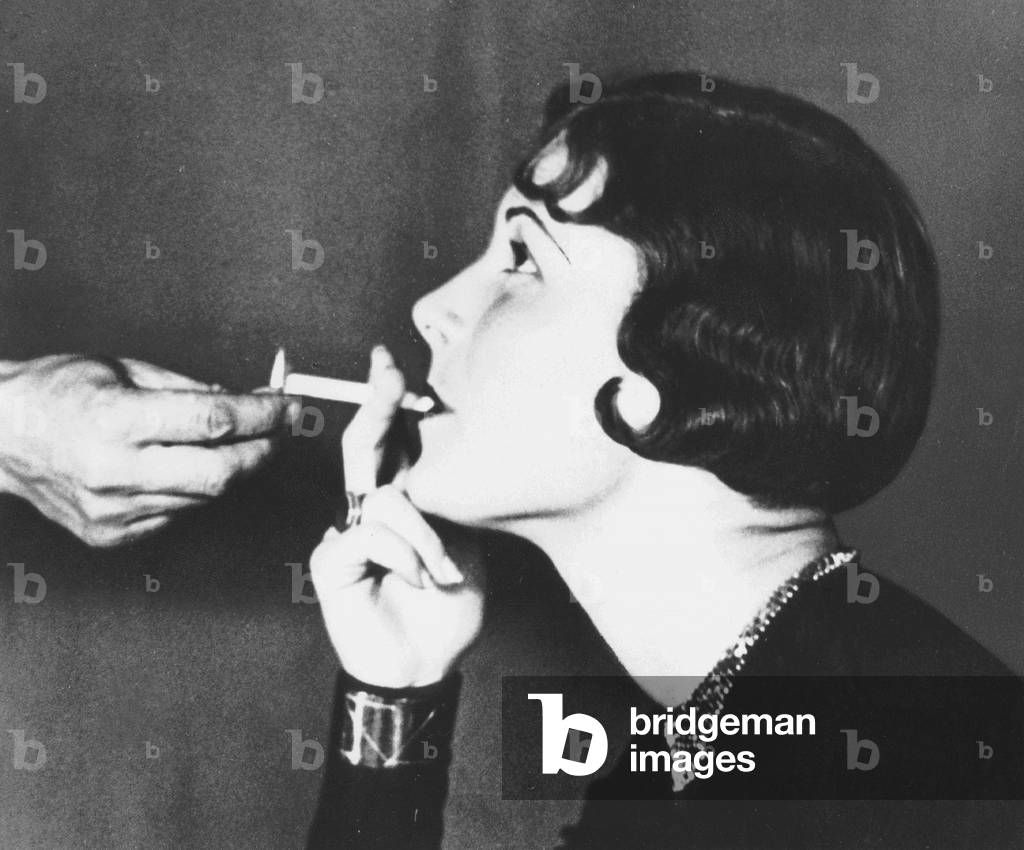 Woman with cigarette, 1933 (b/w photo)