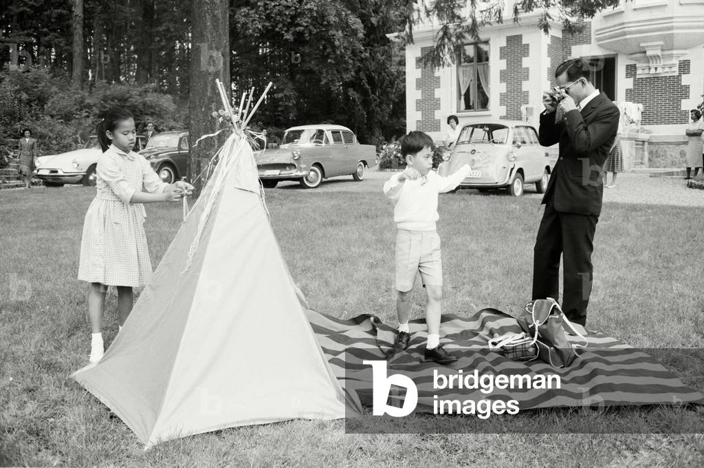 King of Thailand Bhumibol ADULYADEJ with his wife SIRIKIT at their house Villa Vadhana near Lausanne (b/w photo)