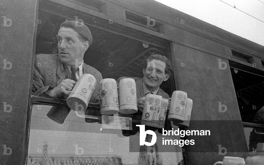 Taking leave of the members of the German Himalayan Expedition in Munich, 1954 (b/w photo)