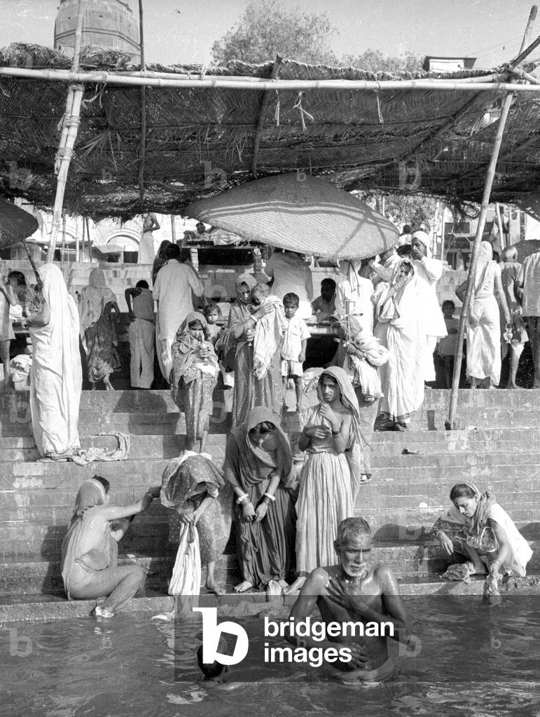 Hindu believers at the Ganges, 1966 (b/w photo)