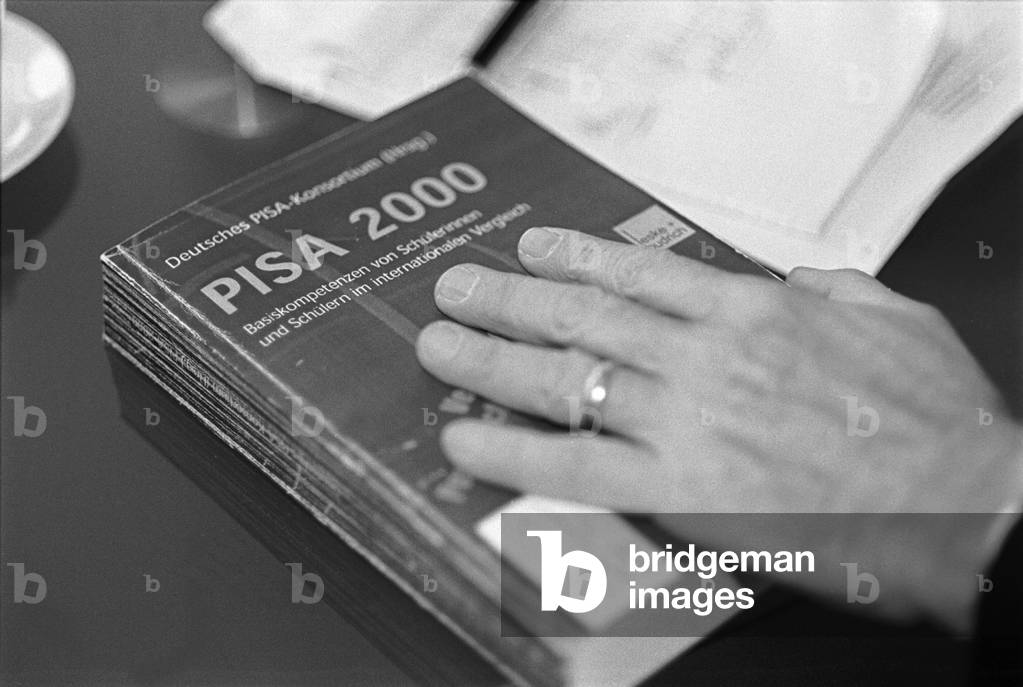 PISA 2000 textbook, 2001 (b/w photo)