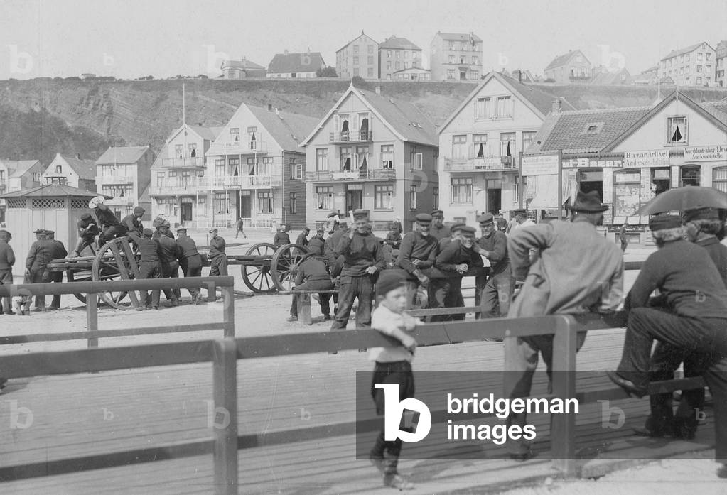Men of Helgoland on the landing stage of the island, 1909 (b/w photo)